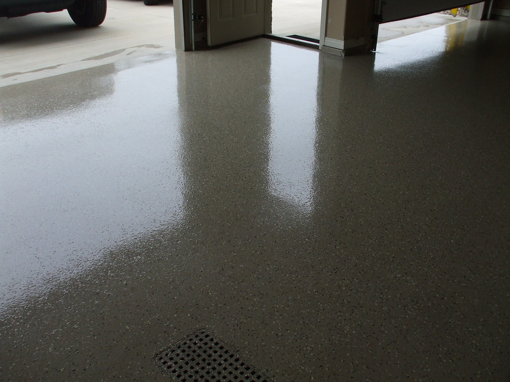 High-gloss flake epoxy reflecting doorway light