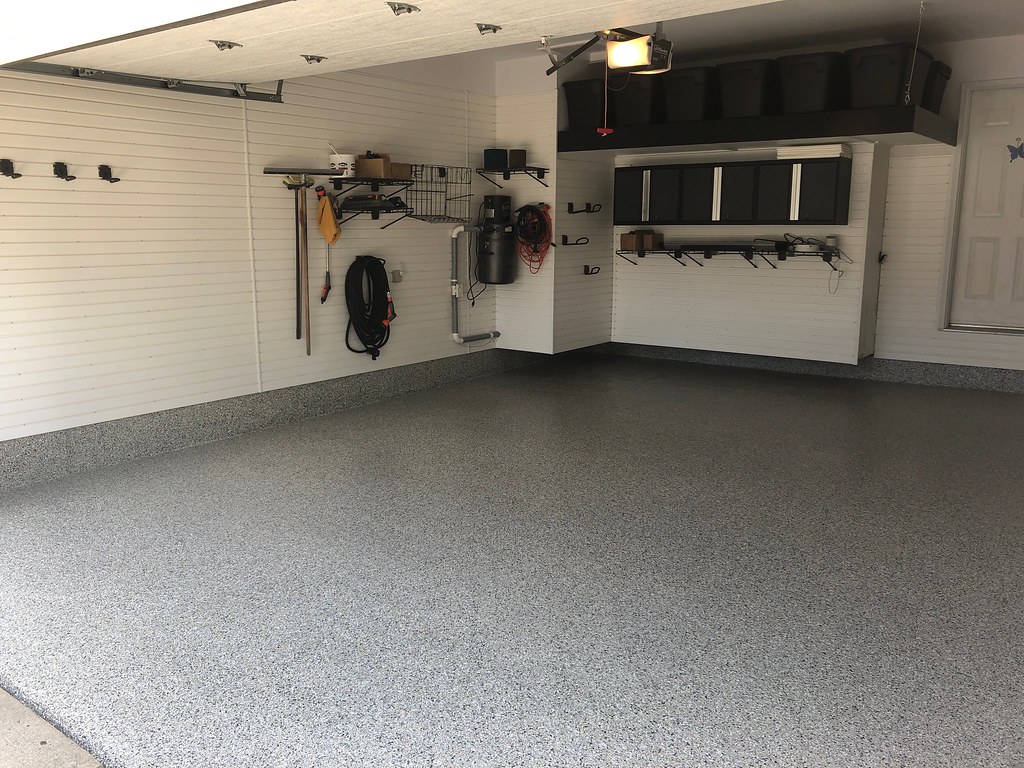 Full-flake epoxy garage floor with organized storage